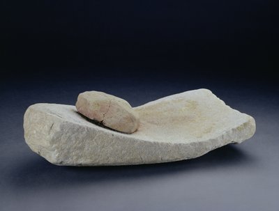 Saddle quern with grinding stone, from a farm at Mingies Ditch, Oxfordshire, Iron Age by Iron Age